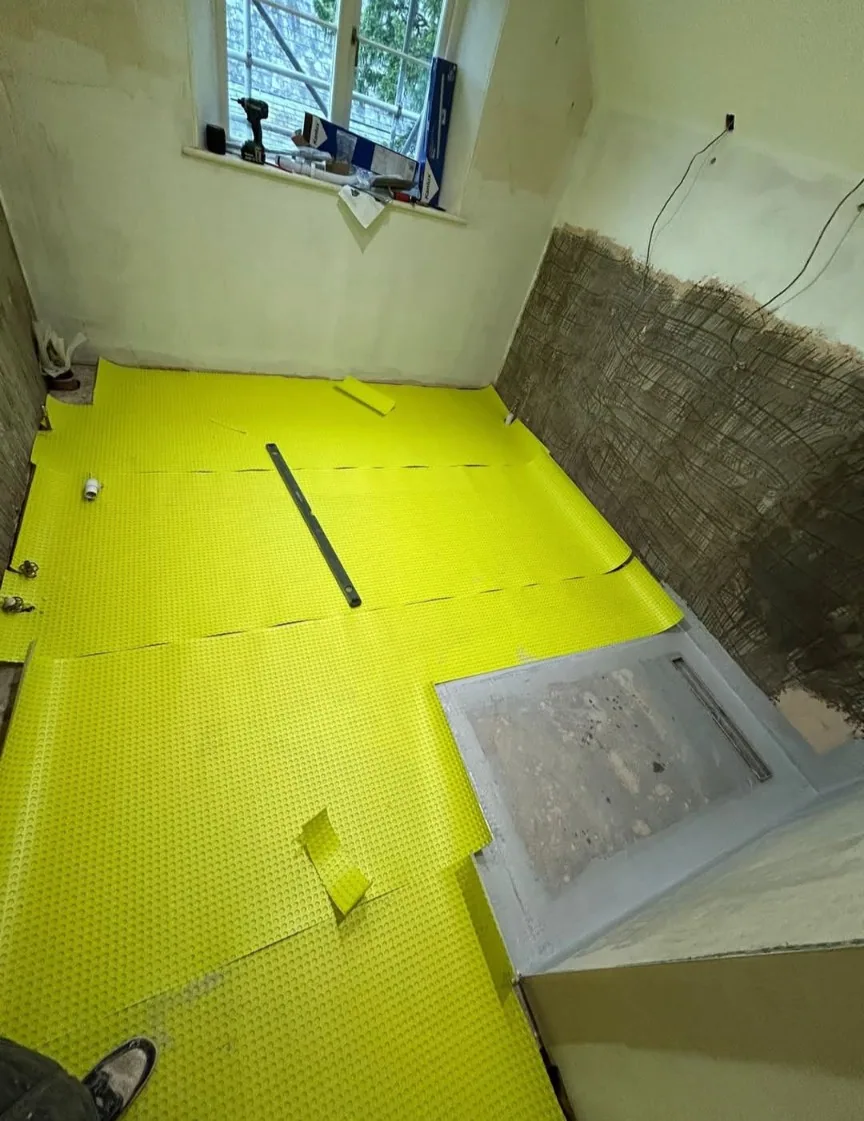 Transforming Spaces: Tiled Wet Room Success!