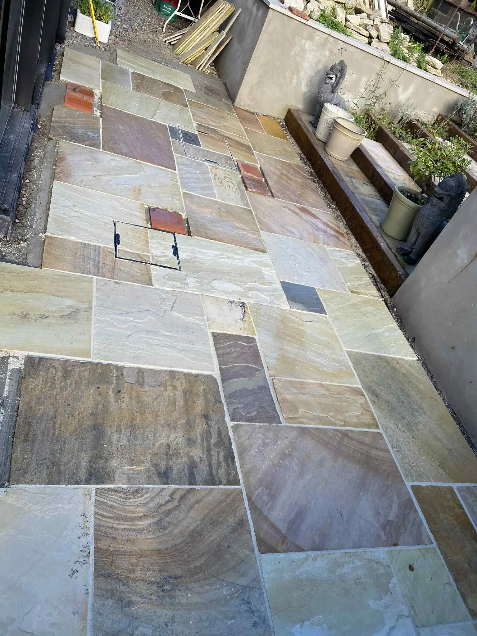 Stone patio with seating area