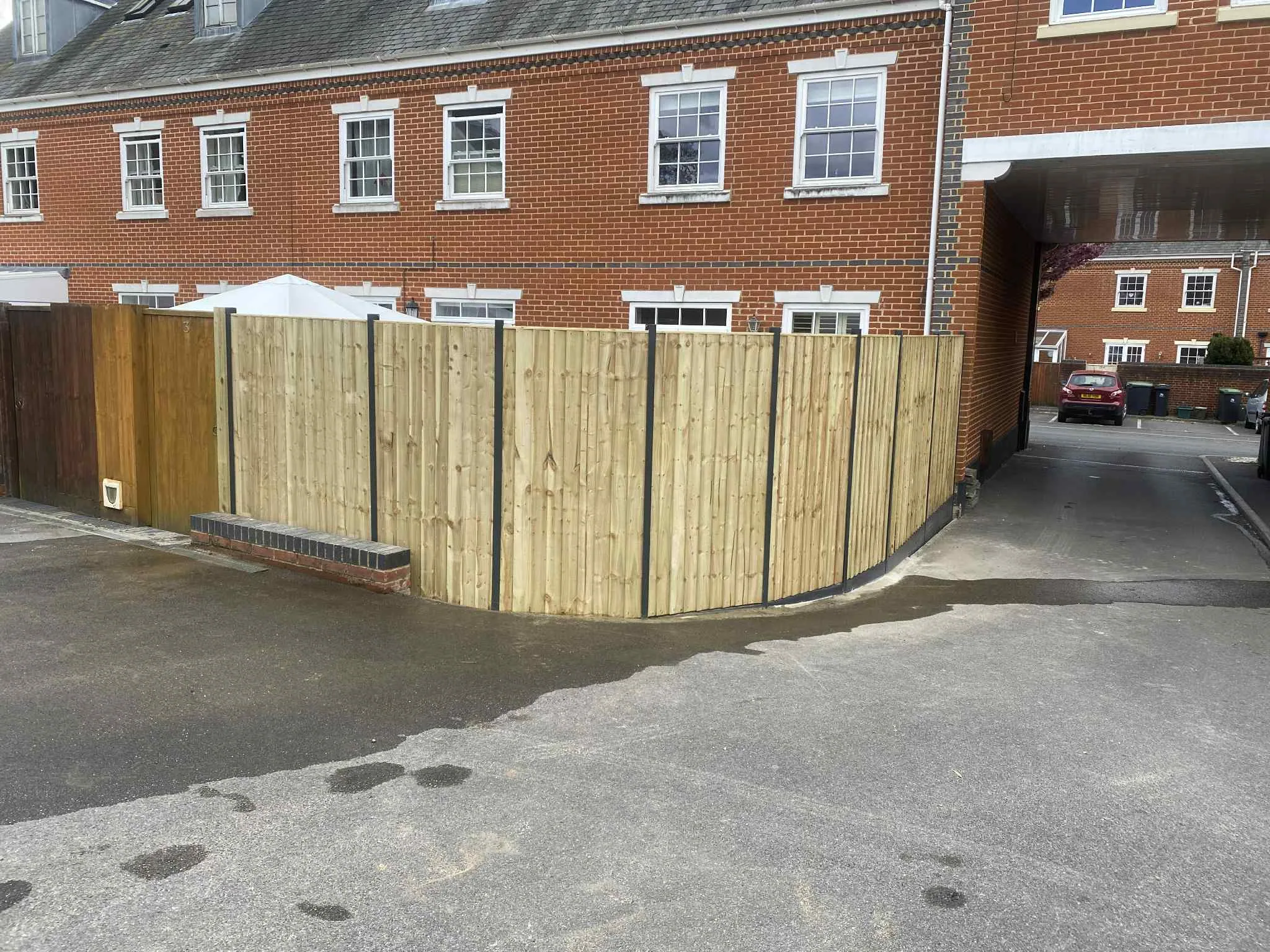 Team installing a premium fence